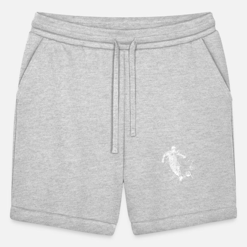 Retro Soccer Player Kicks A Ball